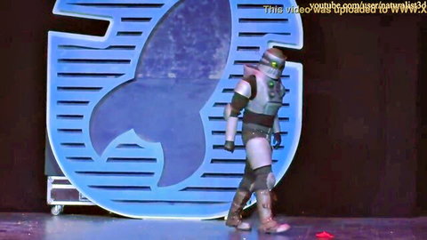 Robot armored cosplayer on STARCON 2015 stage with blue rocket logo