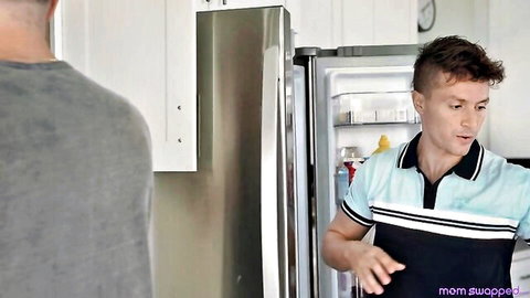 Two studs in kitchen fridge scene from mom swap swinger party