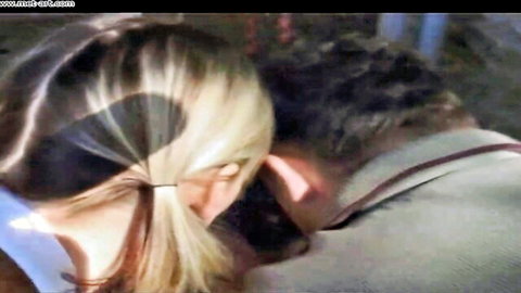 Danae A blonde in pigtails whispers intimately to man in Met Art rodeo scene
