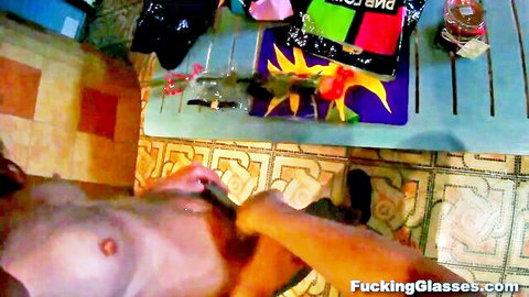 Shirtless Asian man stroking erect cock solo in tiled area