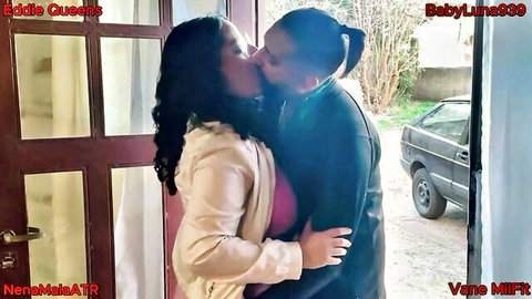 Ebony MILF with big tits passionately kissing interracial stud outdoors