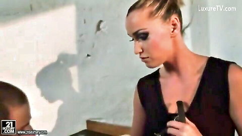 Kathia Nobili blonde in black dress, profile view on call