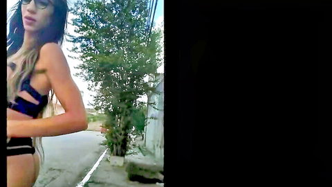 Paloma Veiga showing her large bulge on street in black lingerie
