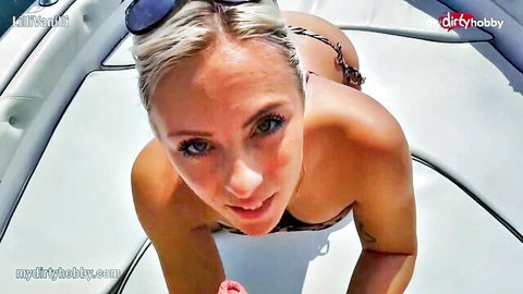 Blonde babe in bikini teasing POV on speedboat