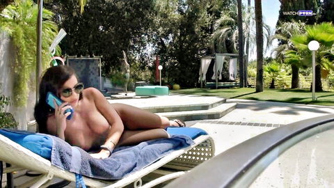 Keisha Grey nude by pool, big tits exposed, talking on phone