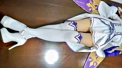 Japanese cosplay girl in white thighhigh stockings and heels lies on floor teasing upskirt thighs