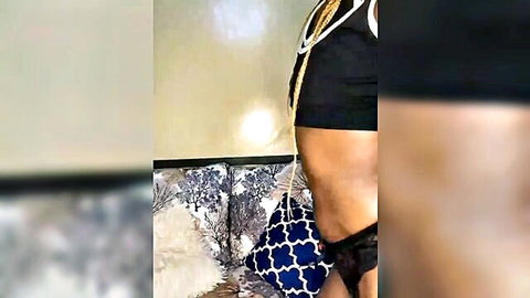 Curvy ebony babe in cropped top and low-rise pants teasing midriff
