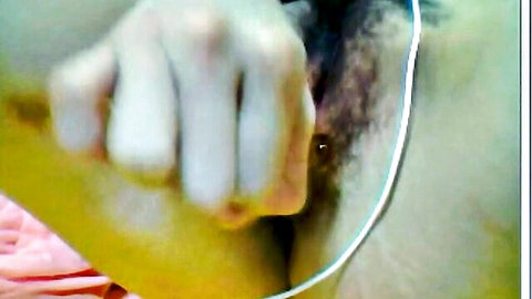 Amateur Asian hand spreading hairy wet pussy lips closeup on webcam