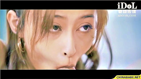 Seductive Chinese babe puckering full lips teasing blowjob closeup