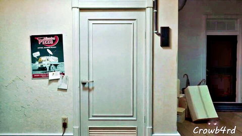 Pizza delivery poster on white door in dimly lit hallway entrance
