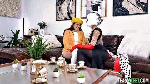 Sexy Cruella de Vil costume lesbians teasing intimately at high tea party