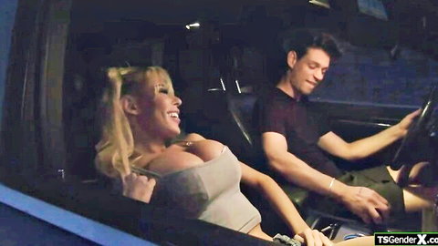 Brittney Kade busty trans hitchhiker in car, hand on driver's crotch