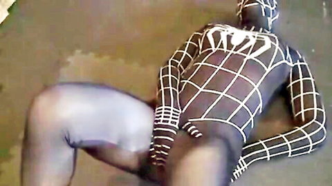 Spidergirl in tight superhero suit masturbating with visible cock
