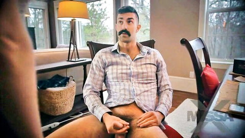 Mustached daddy sits in office chair with shirt open gripping his exposed hard cock