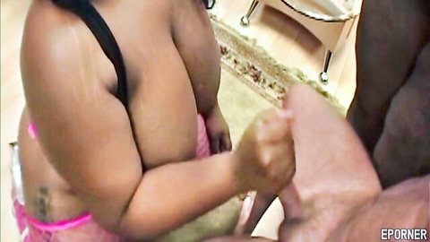 Chubby ebony BBW with huge tits grabs thick black cock handjob
