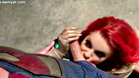 Redhead superhero parody babe in gloves giving blowjob