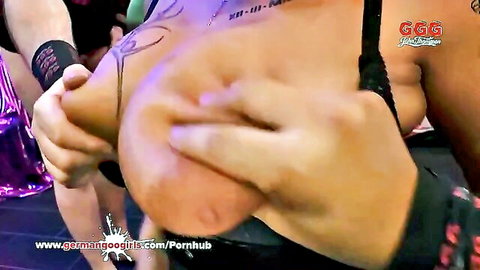 Tattooed German babe with massive tits groped roughly in hardcore scene