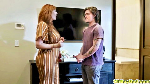 Lauren Phillips in striped dress holding hands with young guy intimately