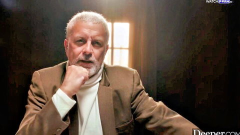 Mature man in brown suit, thoughtful pose in Deeper's Yhivi video