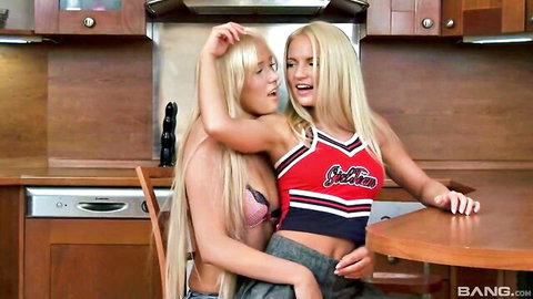 Busty blonde teens Teena Lipoldino and Breatney in lesbian kitchen embrace
