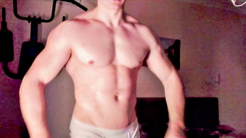 Muscular young man flexing in tight underwear, gay porn thumbnail