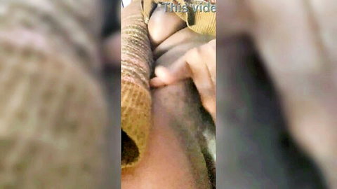 Solo ebony beauty teasing intimately in blurry close-up