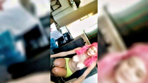 Misty pink-haired babe topless in yellow skirt exposing body
