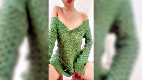 Transfairy99 in green off-shoulder sweater, teasing legs spread pose