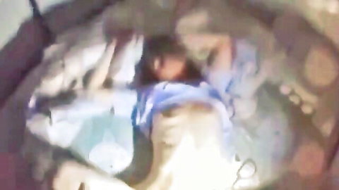 Teen wife cheating on spouse in disheveled blue dress on bed