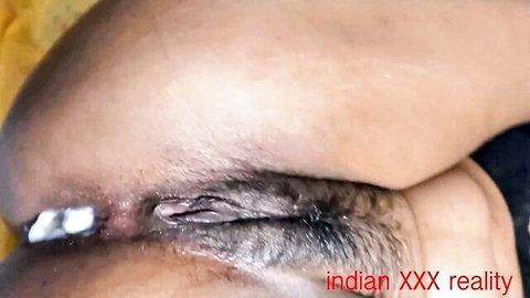 Indian woman's tight ass close-up with vulva, anus, pubic hair and cum