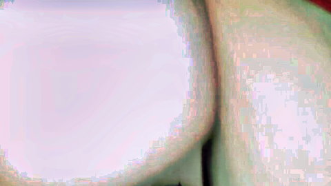 Blurry close-up of pale ass cheeks and pink skin folds in amateur homemade porn.