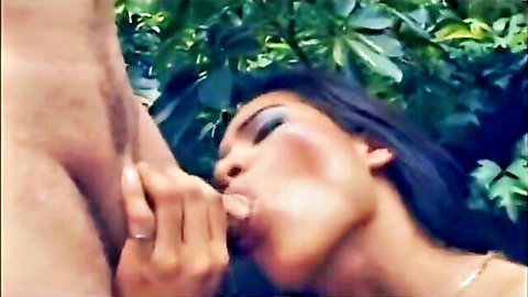 Latin trans babe in red underwear gives outdoor blowjob to man
