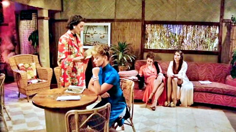 Jessie St James in elegant kimono with friends in tropical lounge