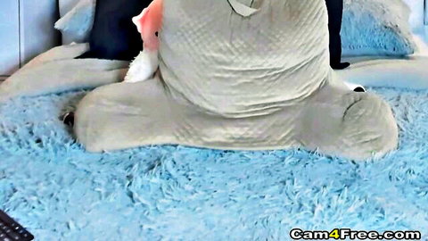 Curvy vixen in gray costume masturbates with large dildo for intense orgasm
