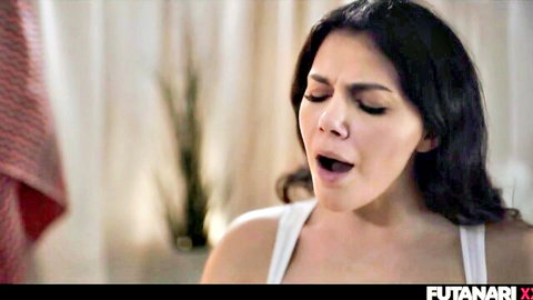 Latina MILF with large tits moaning passionately in white tank top