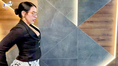 Kylei Ellish as sexy Latina MILF secretary in open blazer, showing cleavage