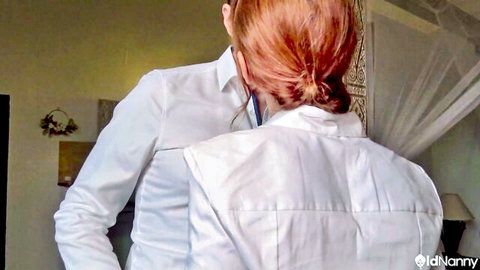 Redhead MILF Emma Rubis in white shirt and stethoscope on bed
