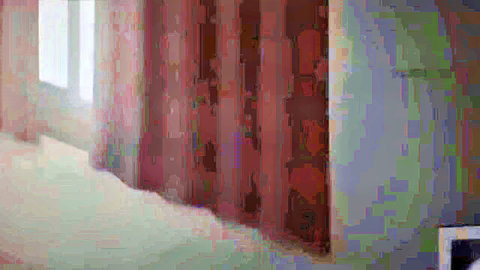 Dimly lit room scene from Kotowarenai Haha Ep.2 JAV