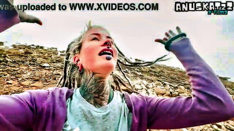 Tattooed blonde with dreadlocks in outdoor public BJ scene, large facial finish