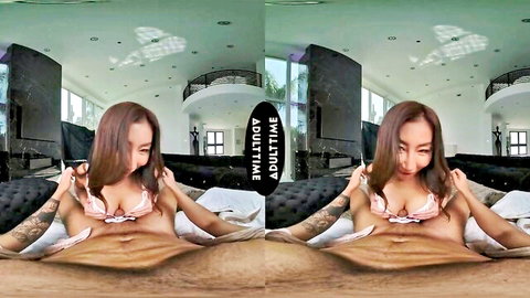 Nicole Doshi in pink lingerie, teasing with cleavage and tattoos