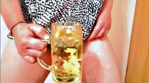 Fat woman spreads legs, holds mug of piss in amateur watersports thirst scene
