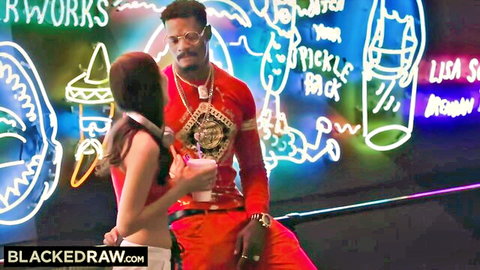 Sexy redhead in skimpy red top flirts with mustached BBC stud in neon club