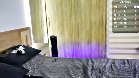 Isabella Dmar seductive bedroom cam tease with Lovense toy