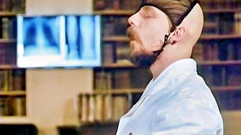 Bearded doctor in lab coat viewing X-ray, classic hardcore porn tease