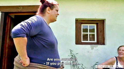 Curvy Czech MILF with big tits in tight blue shirt looks surprised outdoors