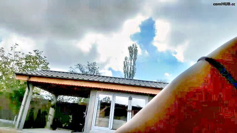 devilbunny01 teasing outdoors in backyard, curvy hips in red bottoms