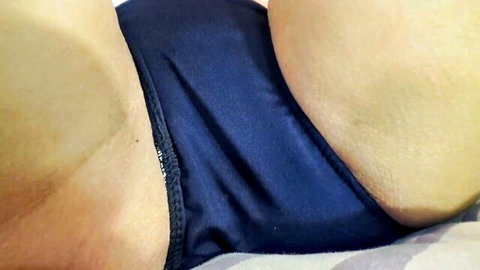 Japanese beauty in blue bloomers and knee socks exposing shaved pussy