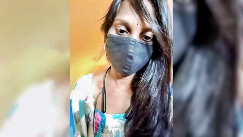 Meghana Telugu Indian beauty in saree mask, long hair tease