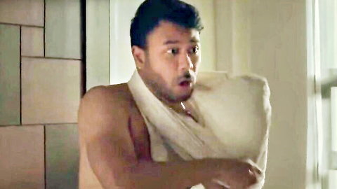 Surprised Asian man in white towel, bare-chested from Kabayo (2023) erotic movie