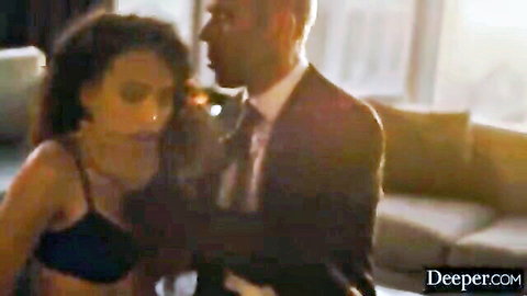 Cecilia Lion in black lingerie embraced intimately by suited black man
